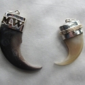 tsterling silver with 14kgold accent capped claws