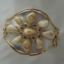 Sterling Silver /14K gold two toned Squash Blosssom style Elk Ivory Bracelet With Rhodolite Garnets