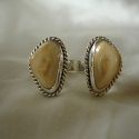 Sterling silver with twisted wire trim Man's Elk Tooth Ivory Cuff Links