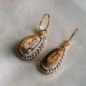 14k Gold Elk Ivory earrings with Twisted wire trim