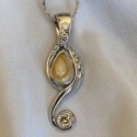 14K white cast pendant with Diamonds
