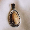 Sterling silver with 14k twist trim and ss smooth wire trim Elk Ivory double trimPendant
