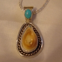 Sterling silver double trim 1 14k twist 1 smooth sterling trim with Turquoise on Bail elk tooth pendant