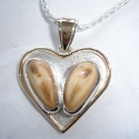Heart shaped pendant with 14k Trimming