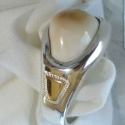 Sterling Silver Cast band style Elk tooth ring with 14k accents